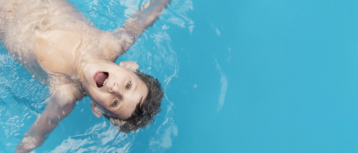 medium shot kid in pool